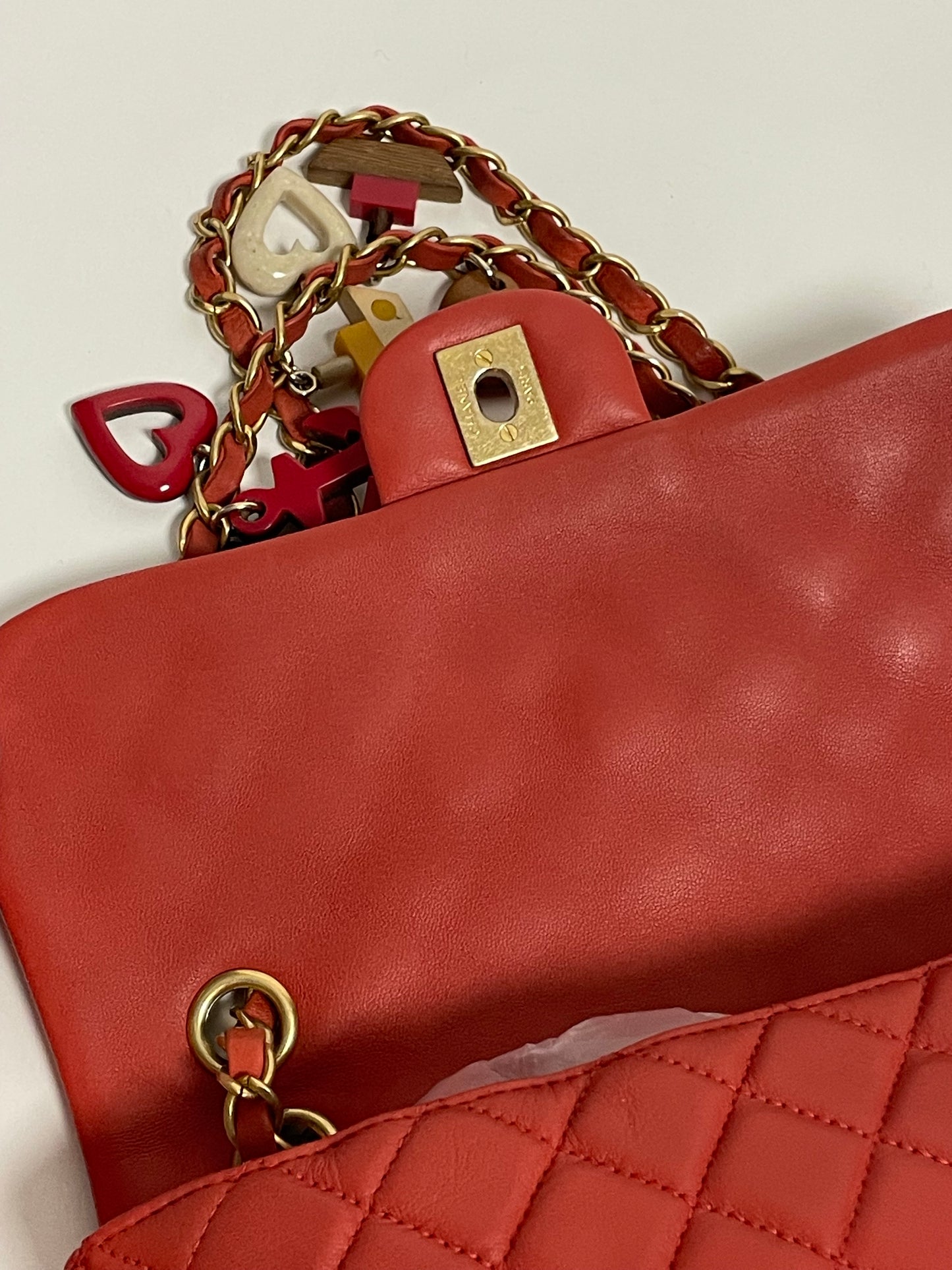 CHANEL red charm single flap bag