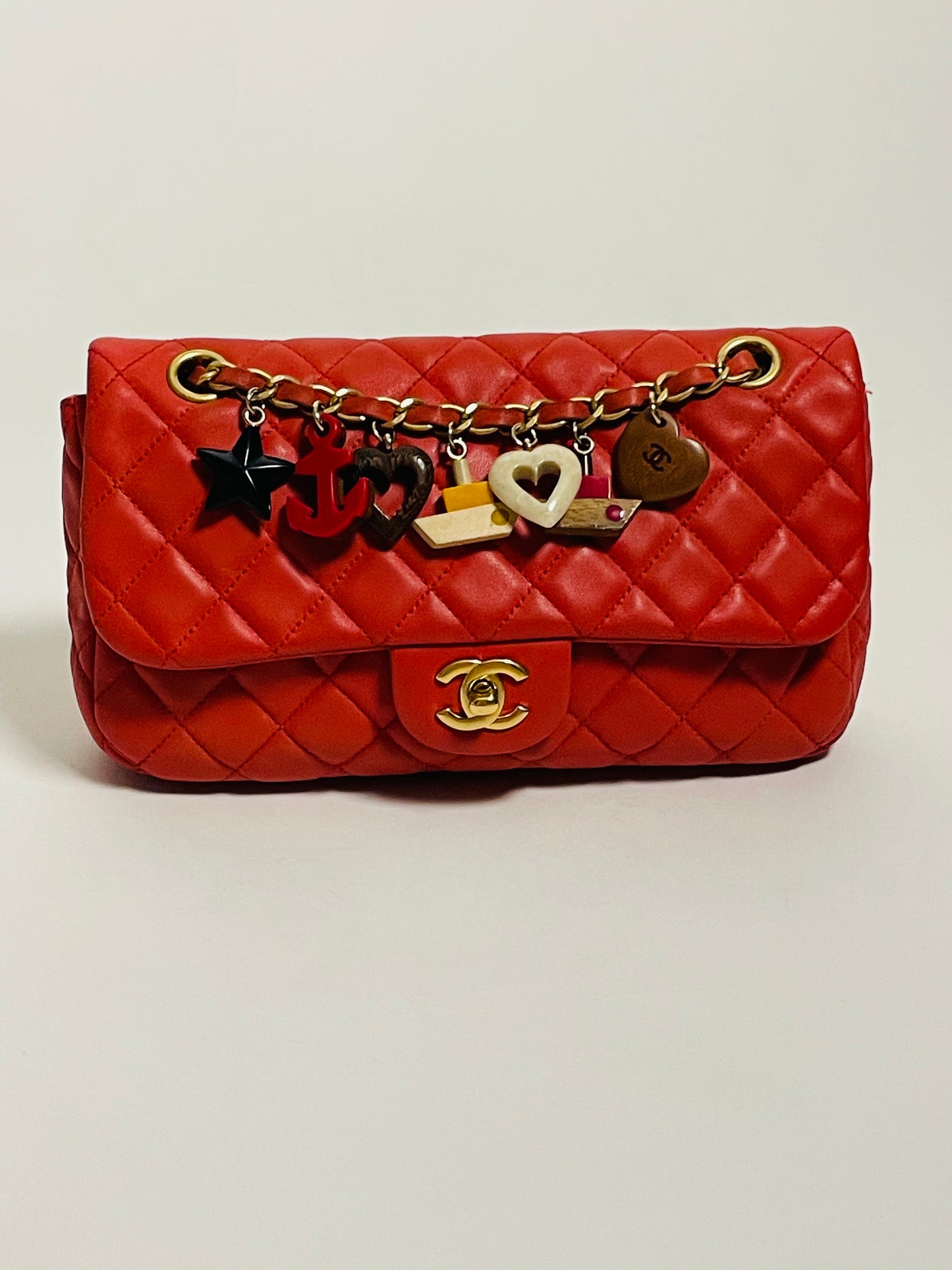 CHANEL red charm single flap bag