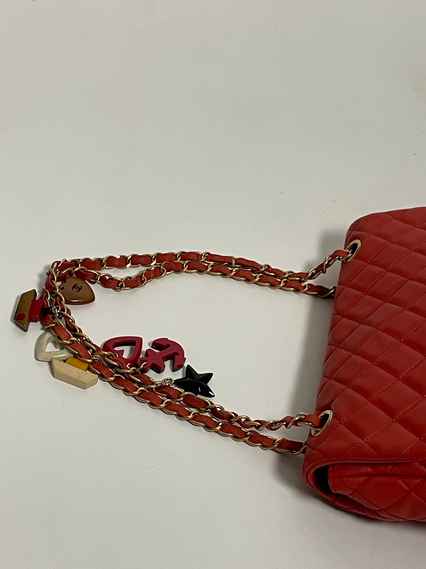 CHANEL red charm single flap bag