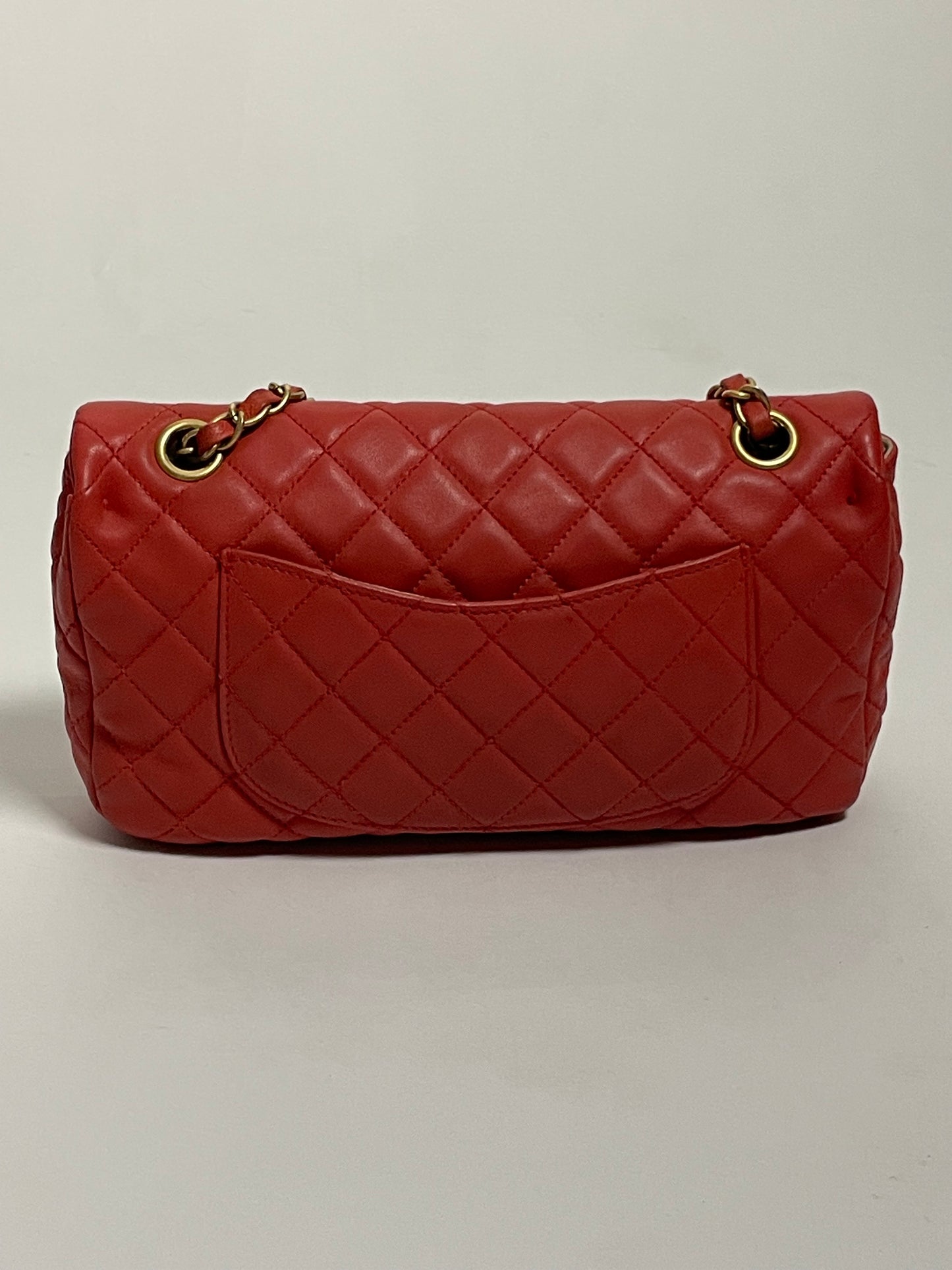 CHANEL red charm single flap bag