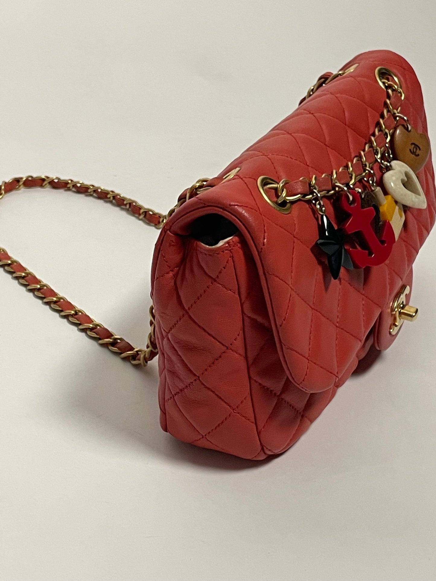 CHANEL red charm single flap bag