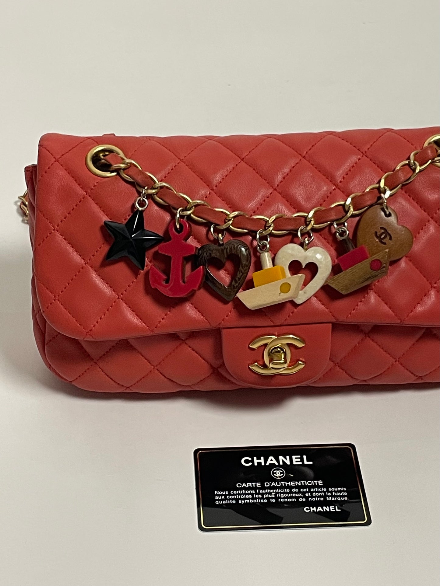 CHANEL red charm single flap bag