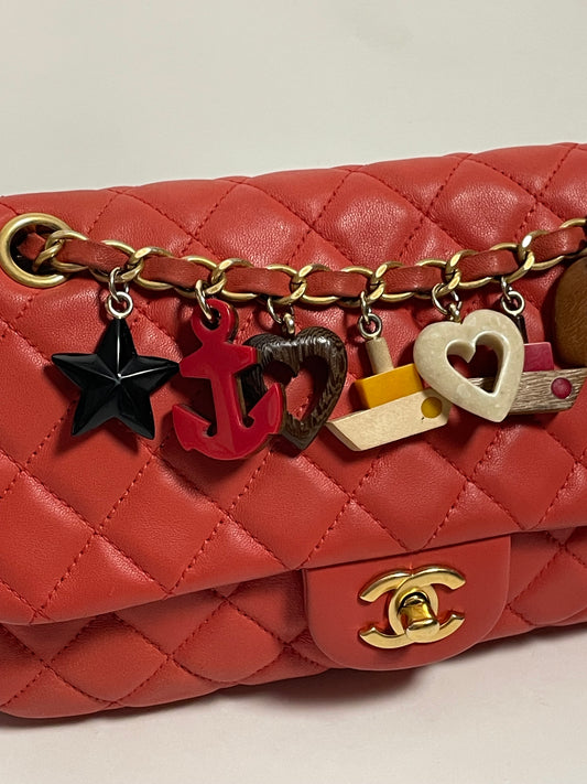 CHANEL red charm single flap bag