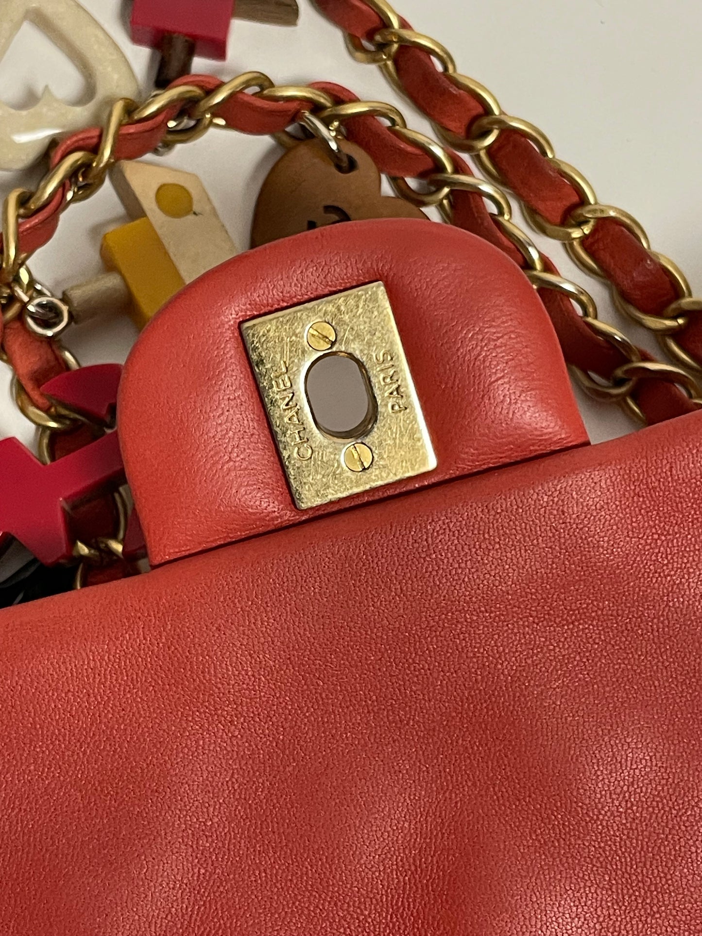 CHANEL red charm single flap bag